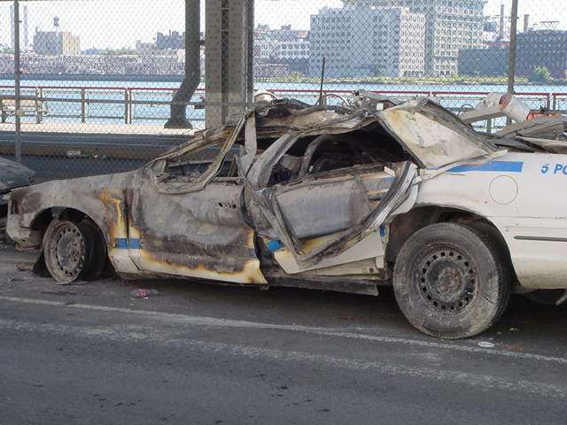 Peculiar wilting of car doors and deformed  window on FDR Drive... half a mile away from the WTC!! - drjudywood.com